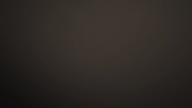 Abstract smooth gradient motion with warm beige shadows and cinematic lighting for video project.
