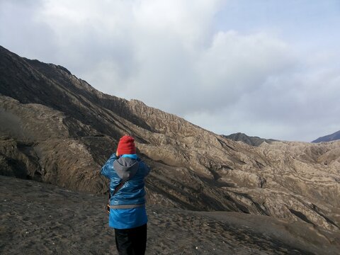 Mount Bromo Volcanic Caldera Landscape with Tourists in East Java Indonesia
