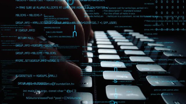 A close-up view of hands typing on a keyboard with abstract digital code floating around, illustrating the integration of technology and data in a modern workspace. Xenic