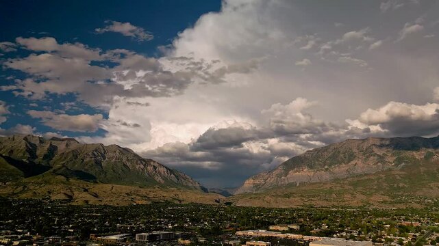 Aerial view of Provo Canyon from over Orem city Utah as the skies filled with clouds after the storm.