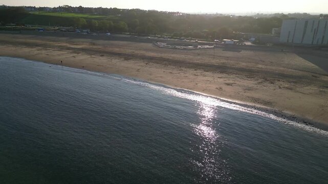 High Angle Drone Camera Footage of Newcastle upon Tyne Beach and Ocean. The Footage Was Captured at Just Before Sunset From Medium High Altitude From Sea Level on 13th October, 2025. 