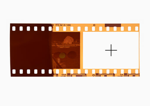 35mm negative film strip mockup template with blank photo frame on white background.