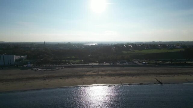High Angle Drone Camera Footage of Newcastle upon Tyne Beach and Ocean. The Footage Was Captured at Just Before Sunset From Medium High Altitude From Sea Level on 13th October, 2025. 