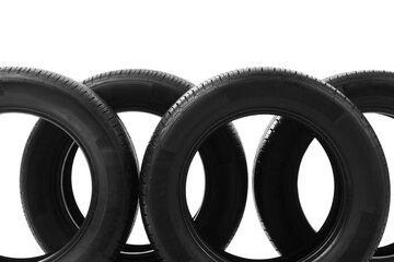 Black car tires on white background © Pixel-Shot