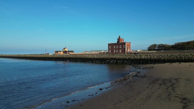 High Angle Drone Camera Footage of Newcastle upon Tyne Beach and Ocean. The Footage Was Captured at Just Before Sunset From Medium High Altitude From Sea Level on 13th October, 2025. 