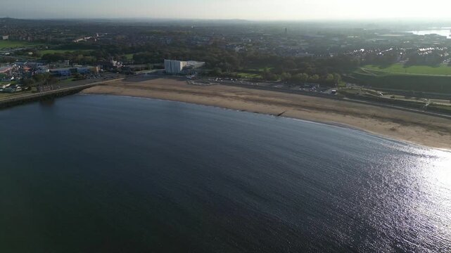 High Angle Drone Camera Footage of Newcastle upon Tyne Beach and Ocean. The Footage Was Captured at Just Before Sunset From Medium High Altitude From Sea Level on 13th October, 2025. 
