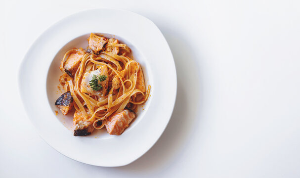 Italian cuisine, Pasta spicy salmon. Top View with copy space