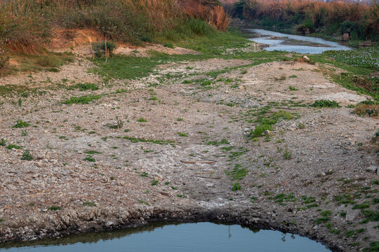 Drought Affected Riverbed with Small Water Pool