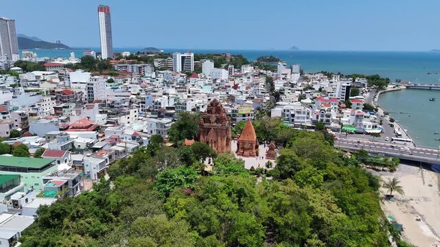 Ancient Cham Ponagar (Po Nagar) towers on green hill in Nha Trang city, Vietnam.