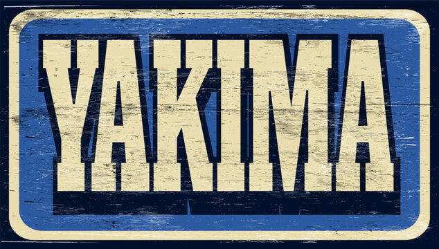 Aged vintage Yakima sign on wood