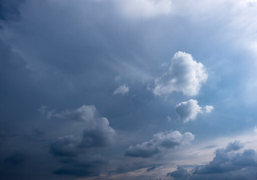 Dark and Moody Thunderstorm Clouds Forming in the Sky Before Heavy Rainfall and Severe Weather,
Dark sky with stormy clouds,Dark clouds before a thunder-storm,clouds before rain