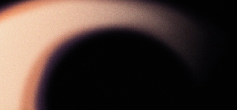 Abstract orange and pink glowing arc sweeping across a dark grainy background, featuring soft illumination, smooth gradients, subtle purple tones