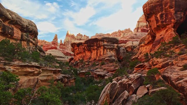Sunset glow over sandstone spires along Druid Arch trail