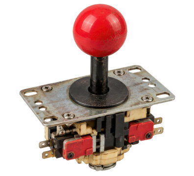 Retro aged arcade joystick mechanism, red ball top lever mounted on square metal plate with switch assembly. Studio shot isolated on white background for retro gaming design.