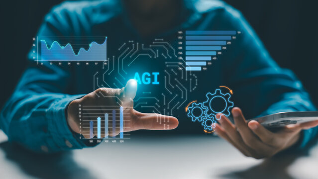 Male businessman using smart phone and touching virtual AGI artificial general intelligence brain screen with financial charts and gear icons for digital business technology development concept.