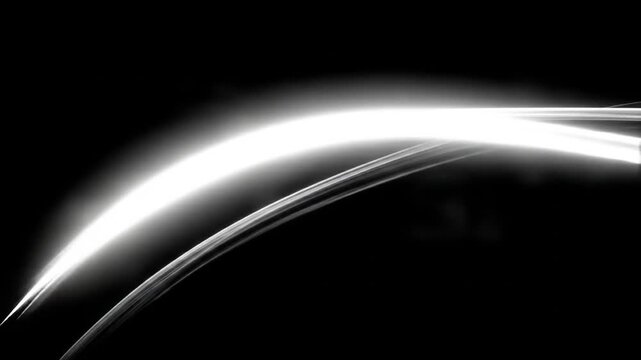 Bright white light streak against a solid black background abstract design