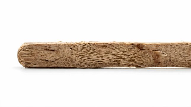 Single rough wooden stick on clean white background