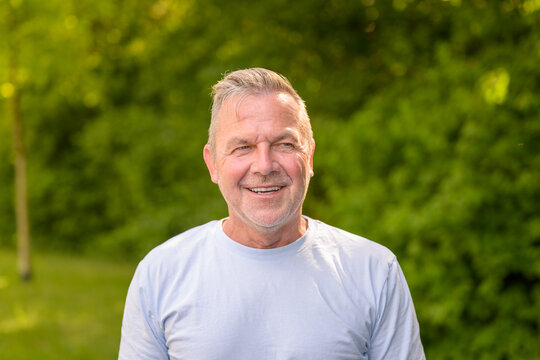 Happy Smiling Senior Outdoors Portrait