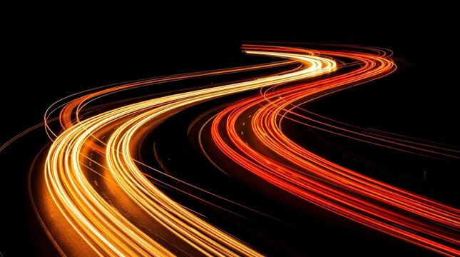Long exposure light trails on winding road, orange and red car light streaks at night, fast motion blur on dark highway background
