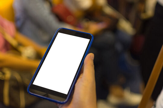 Close view of person holding smartphone blank white screen for mobile app advertising digital content mockup communication technology concepts