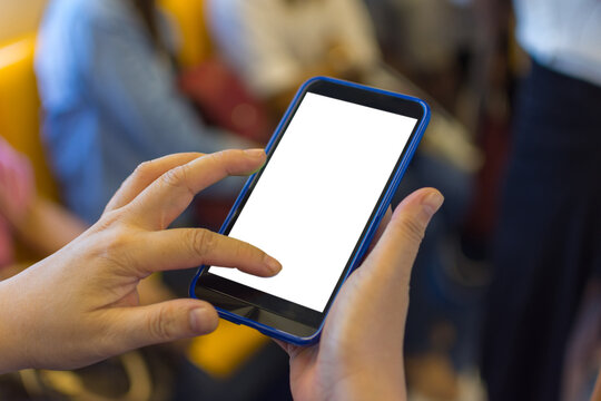 Close view of hands interacting smartphone featuring blank white screen suitable for mobile applications digital marketing communication technology user interface concepts