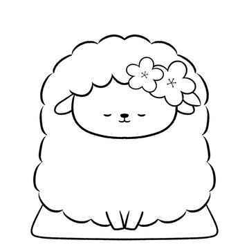 白黒　頭に髪飾りをつけて座っている羊