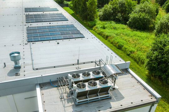 Commercial rooftop with photovoltaic and cooling equipment