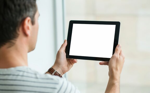 Digital tablet mockup, man holding computer device with blank white screen. Modern technology lifestyle
