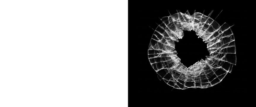 Shattered glass hole on black background, broken window texture with radial cracks, realistic bullet hole impact effect for composite design