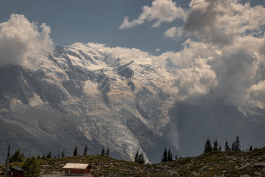 Mont blanc glacier and clouds over chamonix valley