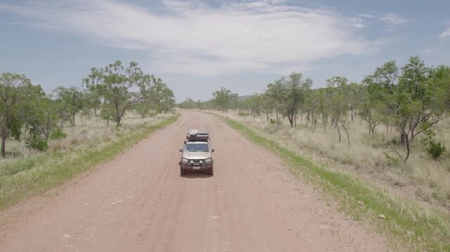 Loaded 4WD Driving Alone on Wide Gravel Road in Australia