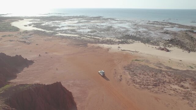 4WD Weaving between Steep Red Rock Walls at James Price Point