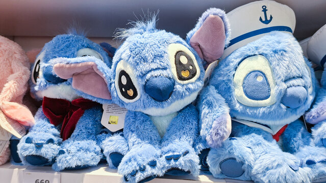 Group of cute Disney Stitch blue plush stuffed toys with sailor hat and bow tie on September 20, 2026 in Bangkok, Thailand.