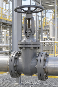 Industrial gate valve with handwheel installed in a modern industrial process plant