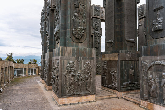 Chronicles of Georgia monument with massive bronze columns in Tbilisi, Georgia