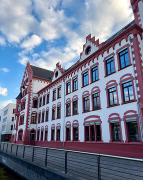 Historic european building with white facade and red trim real estate building architecture
