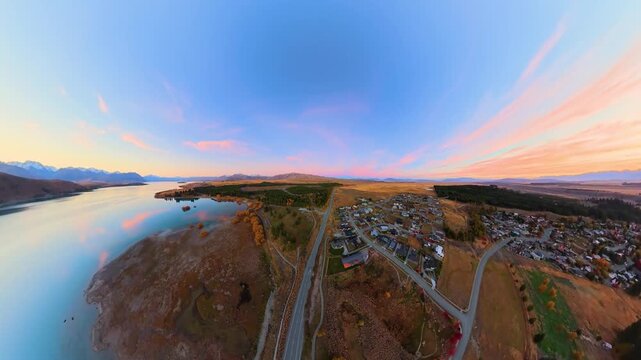 Aerial view of New Zealand, sunset panorama over the small town of Lake Tekapo