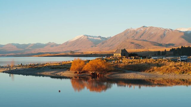 Distant mountains, the lakeshore, and the church &ndash; Good Shepherd Church at Lake Tekapo, New Zealand
