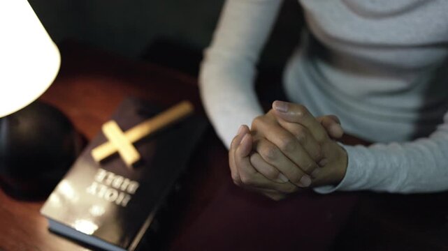 Close Up of Religious Young Woman Praying in Faith