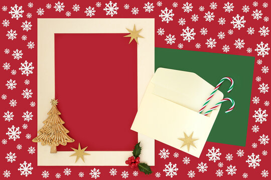 Decorative Christmas mail art envelope with traditional symbols of Xmas decorations and snowflakes. Design for festive season on geometric background.