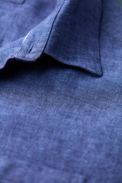 Close up of men's linen shirt. Soft focus.