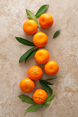 Mandarins fresh citrus fruit with green leaves