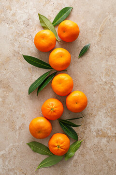 Mandarins fresh citrus fruit with green leaves