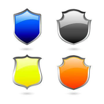 Four colorful glossy shield isolated on a transparent background