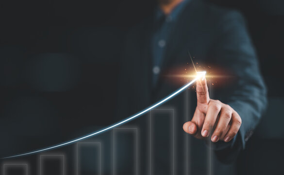 Business development to success and growing growth concept, Businessman pointing arrow graph corporate future growth plan