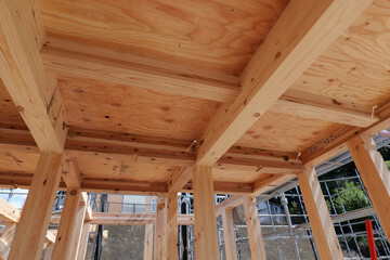 Timber Framing Structure of Residential Building at Construction Site, Low Angle View © Andriy Mishchak