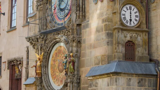 Prague astronomical clock orloj medieval tower landmark tilt up shot in old town square.