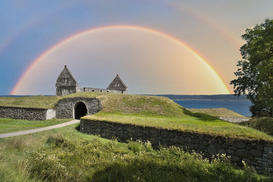 Spectacular Double Rainbow Over Historic Castle Ruin on the Coast.
