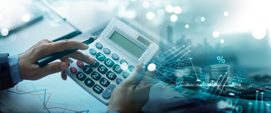 Businessman using calculator to calculate financial capital calculations, Graph showing the growth of investment results, Stock market, Planning and strategy, Risk analysis to compare business growth.