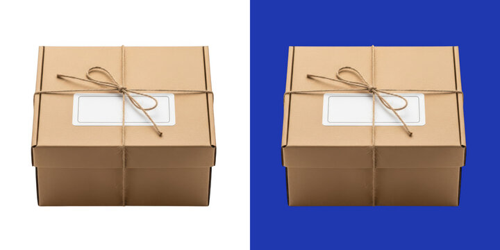 Cardboard mailing box with twine ribbon and blank shipping label transparent png